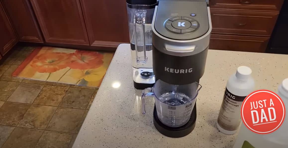 keurig k supreme next to bottle of vinegar