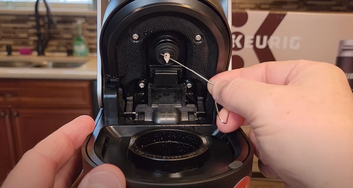 cleaning top needle of keurig k slim side to side