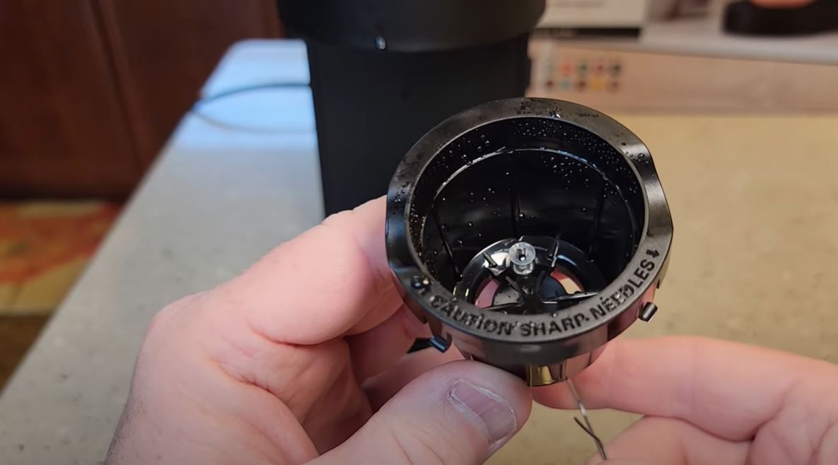 inserting needle into keurig k slim basket