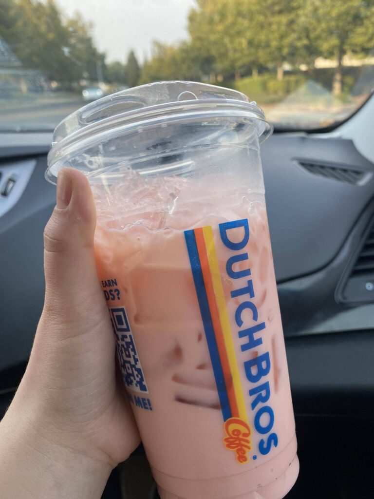 dutch bros strawberry horchata chai in car